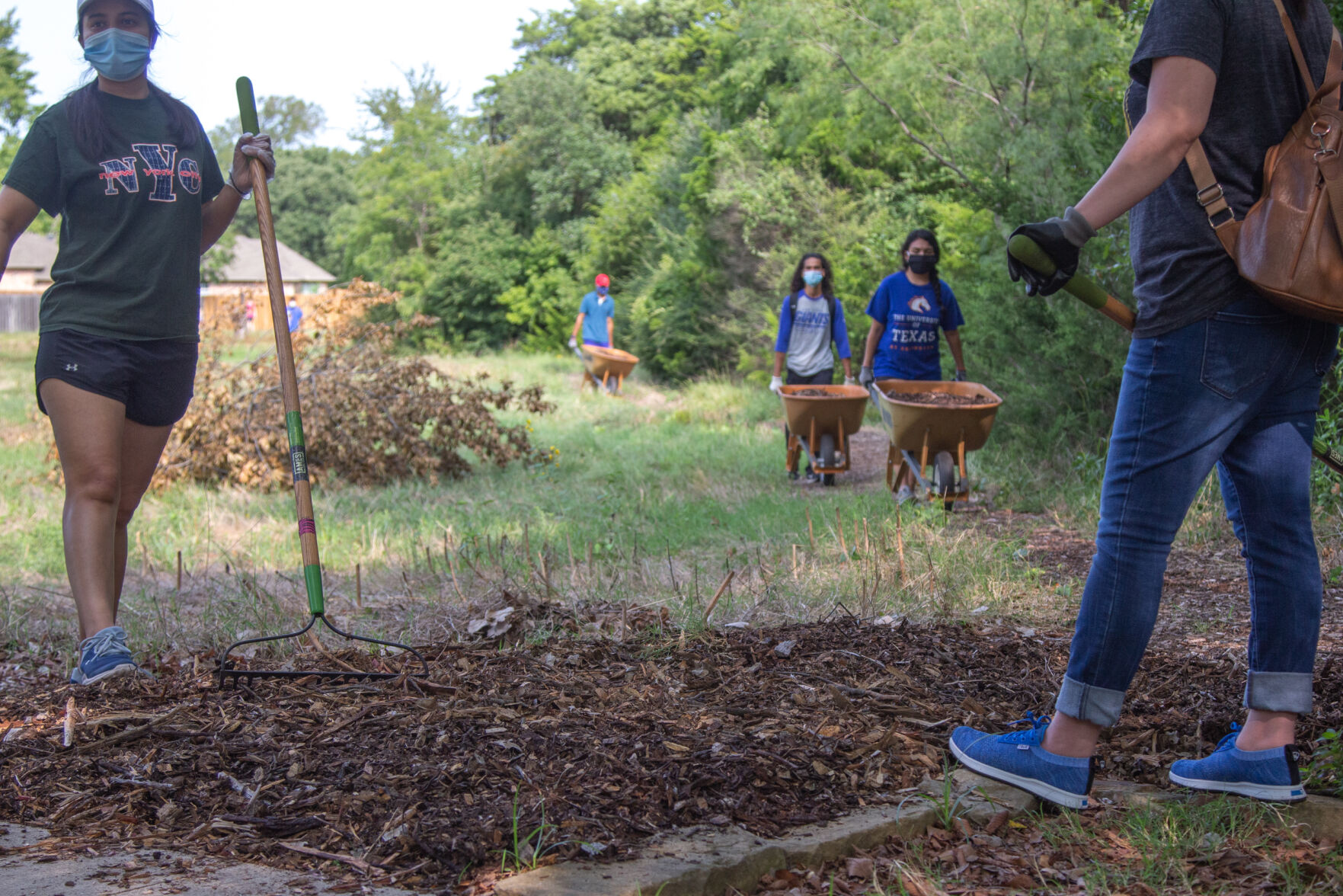 Photos: Volunteers improve trails at O.S. Gray Natural Area for Super Service Saturday